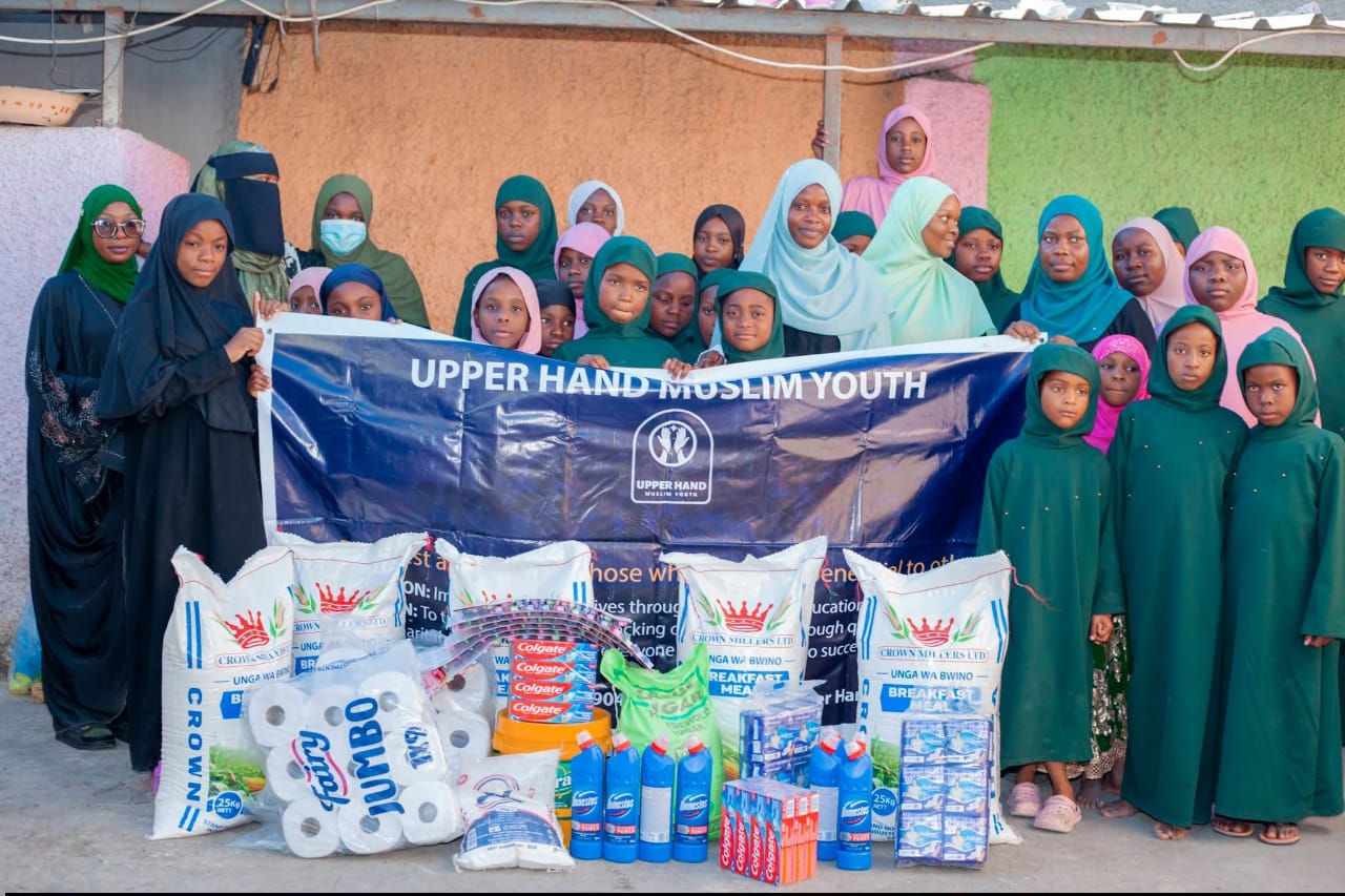 Upper Hand Muslim Youth members during a community activity in Lusaka