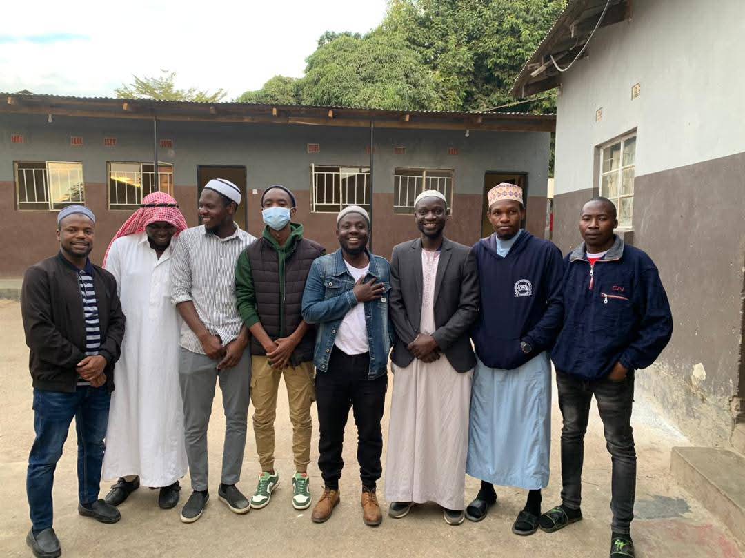Handing over donations to a family